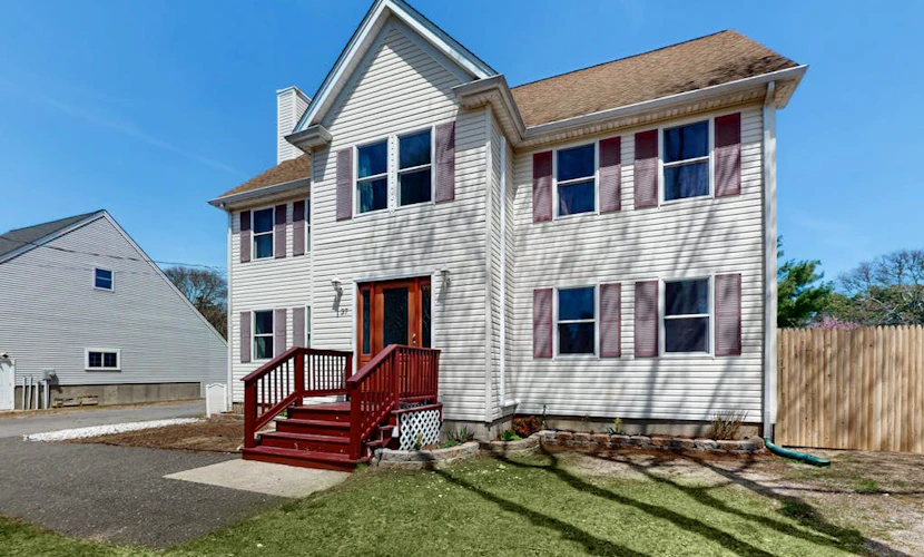 Charming coastal home with sunny rooms, private backyard, & walk to beach