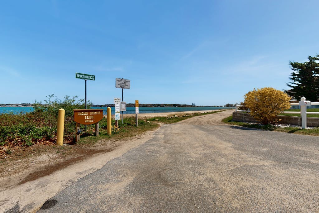 Charming coastal home with sunny rooms, private backyard, & walk to beach