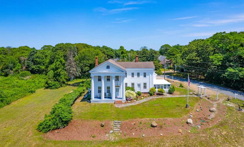 Grand home with historic charm, game room & spacious outdoor living spaces