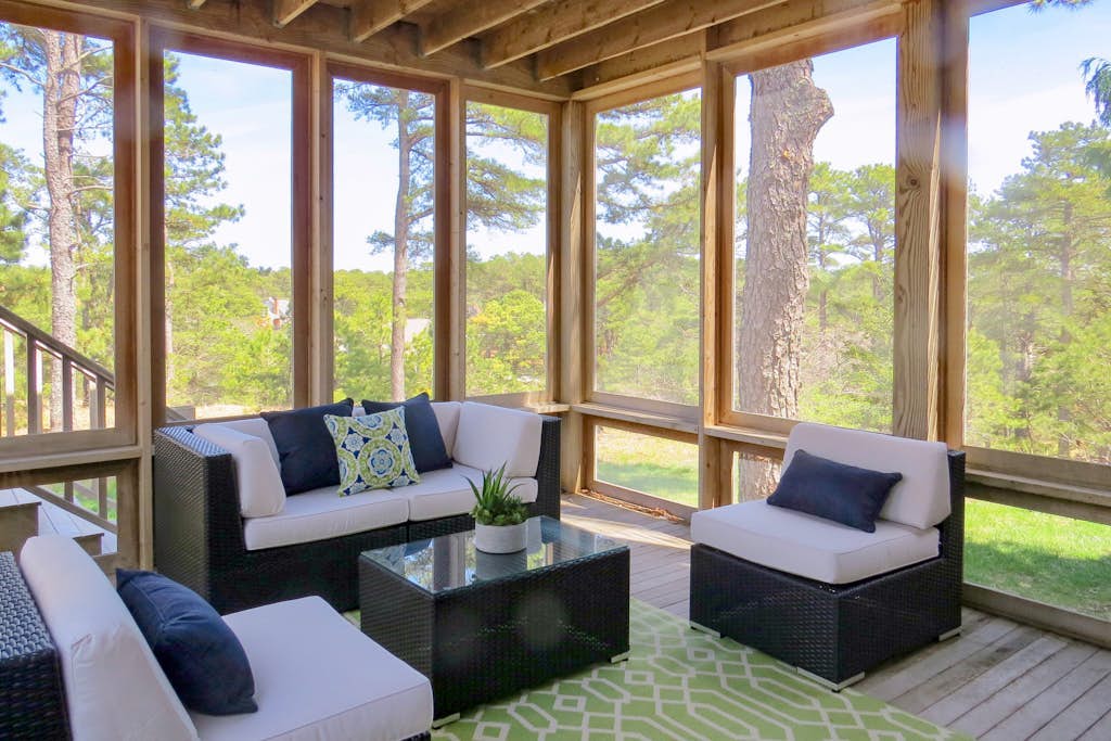 Striking Home with Scenic Marsh Views, Multiple Living Areas, Stroll to Bay