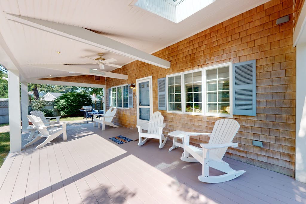 Tree-lined home with lovely yard, decks & private beach access - walk to town