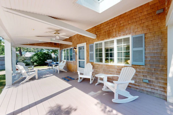 Tree-lined home with lovely yard, decks & private beach access - walk to town