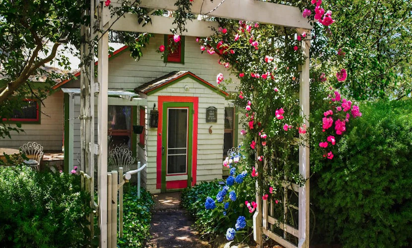 Historic cottage with patio, games, walk to beach & dog-friendly fenced yard