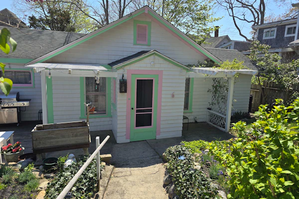 Historic cottage with patio, games, walk to beach & dog-friendly fenced yard