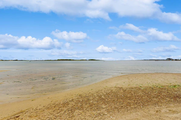 Peaceful waterfront home with private beach, marsh views, AC & spacious interior