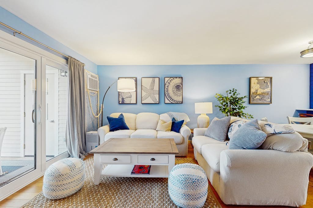 Modern fairway condo with open layout, private patio, AC & washer/dryer
