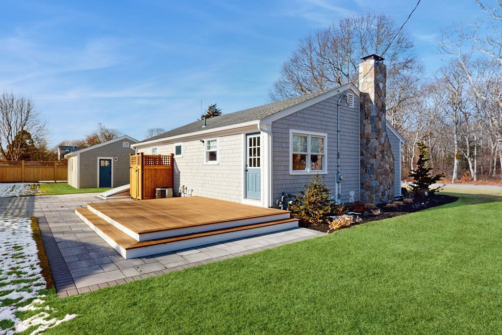 Peaceful Maravista escape with AC, W/D, yard, walk to Great Pond, & breezy charm