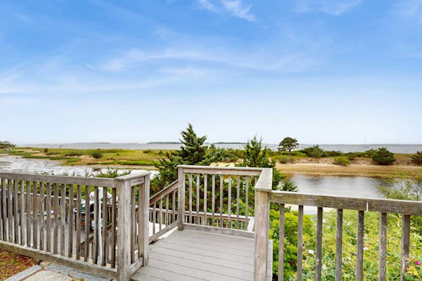 Quintessential coastal studio with beach access, BBQ area, patio, & water views