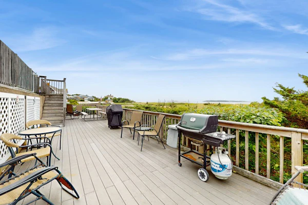 Quintessential coastal studio with beach access, BBQ area, patio, & water views