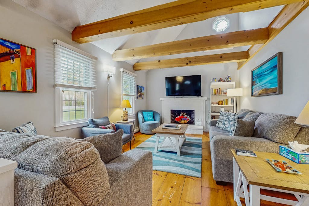 Cheery house with deck, sunroom & patio - short walk to pond, beach & Rail Trail