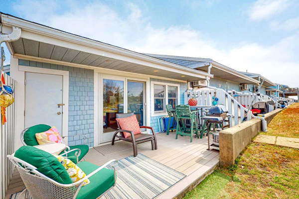 Seaside condo with patio, beach access, loft, board games, gas grill, & firepit