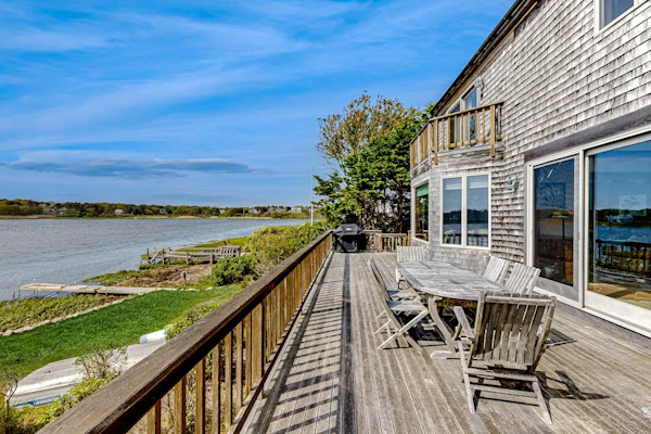 Waterfront house on Bucks Creek Marsh with deck, dock, & kayaks