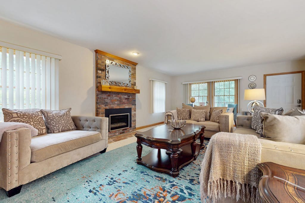 Serene home near the beach with open floor plan, yard, grill, & central AC