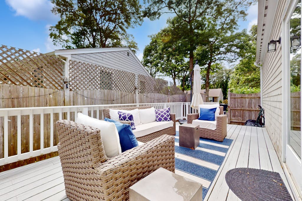 Serene home near the beach with open floor plan, yard, grill, & central AC