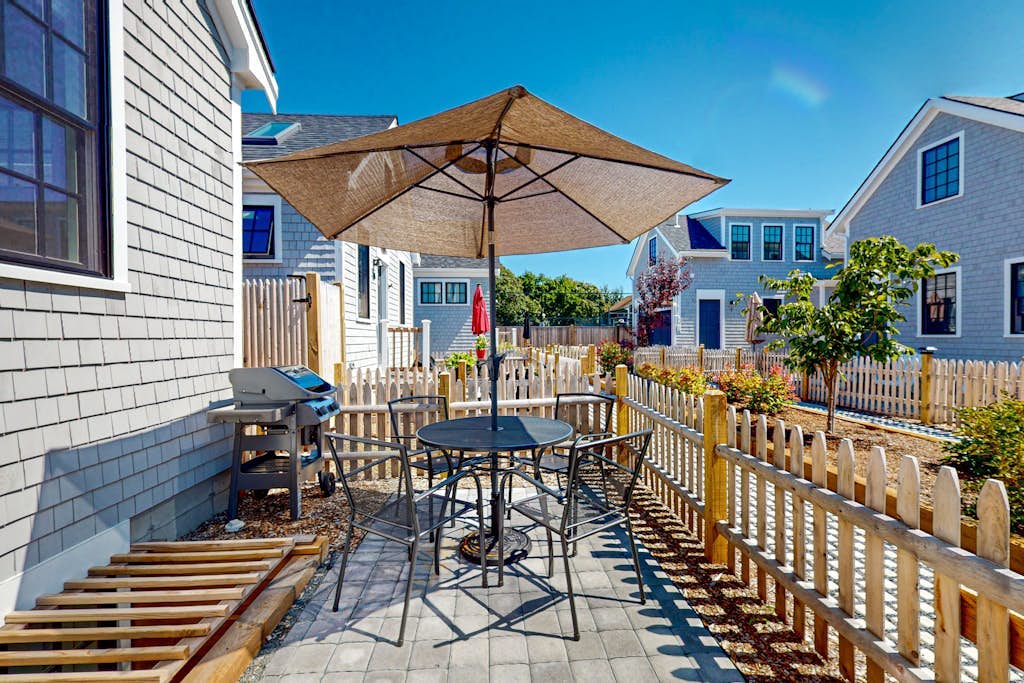 Temporary oasis with custom touches, enclosed yard, grill, and washer/dryer