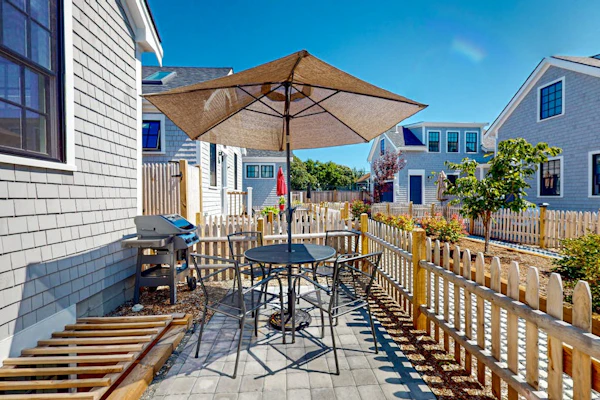 Temporary oasis with custom touches, enclosed yard, grill, and washer/dryer