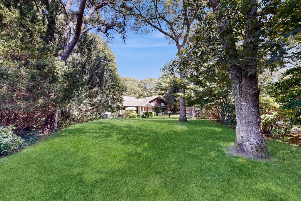 Beautiful Estate with Large Lawn Made for Socializing and Kids' Playroom