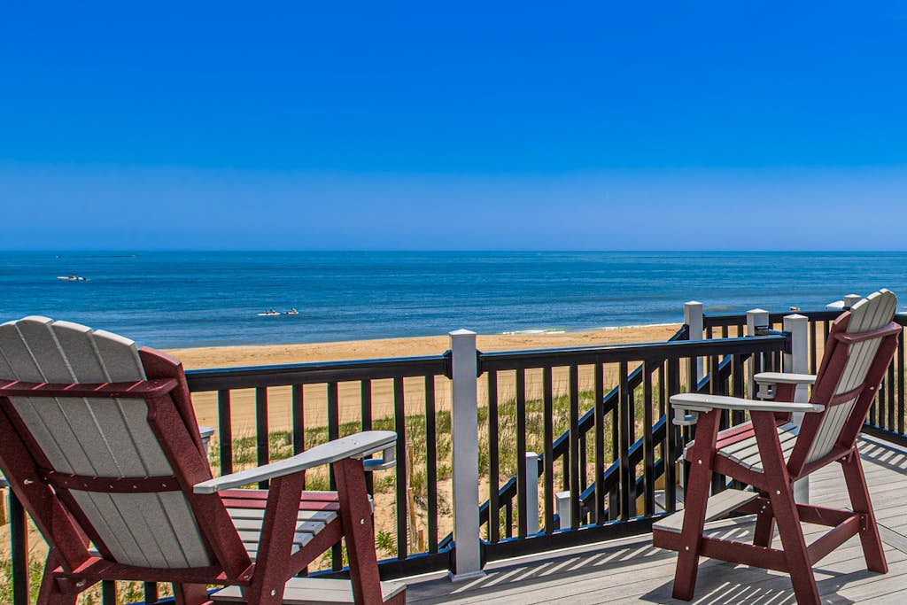 Stunning oceanfront home with private indoor/outdoor pools, game room, theater