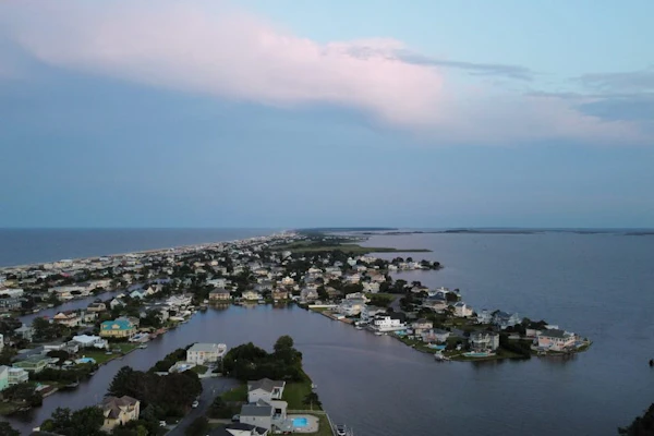 Bayfront dog-friendly retreat w/ private, seasonal pool, decks, game rooms & AC
