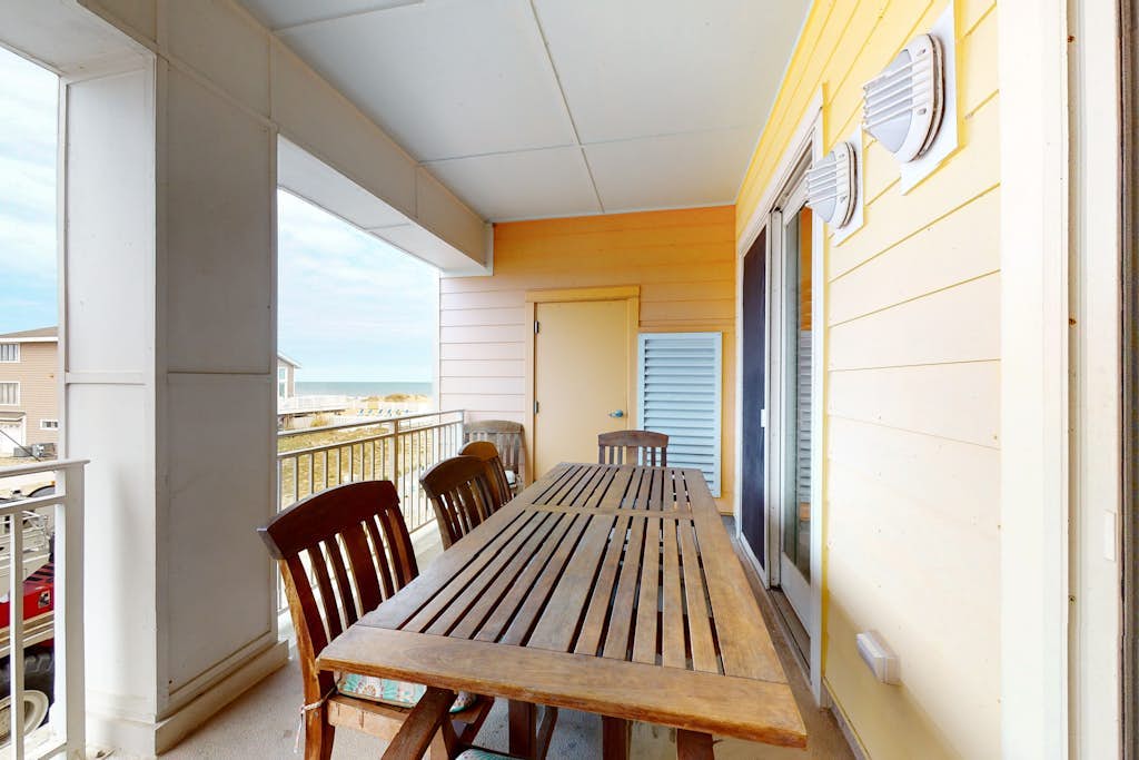 Inviting condo steps from the beach with balcony & resort pools