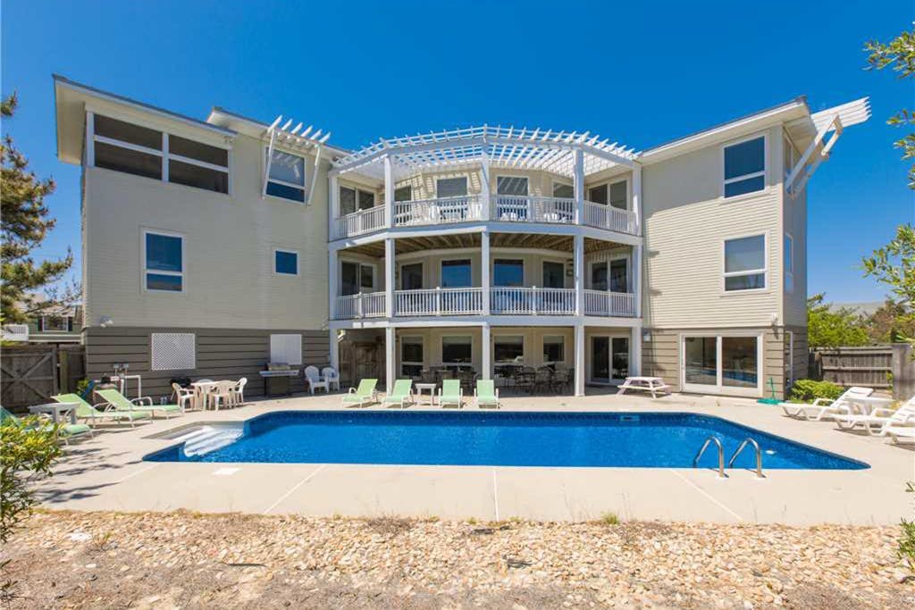 Three-story home with private pool, elevator, private W/D, and central AC