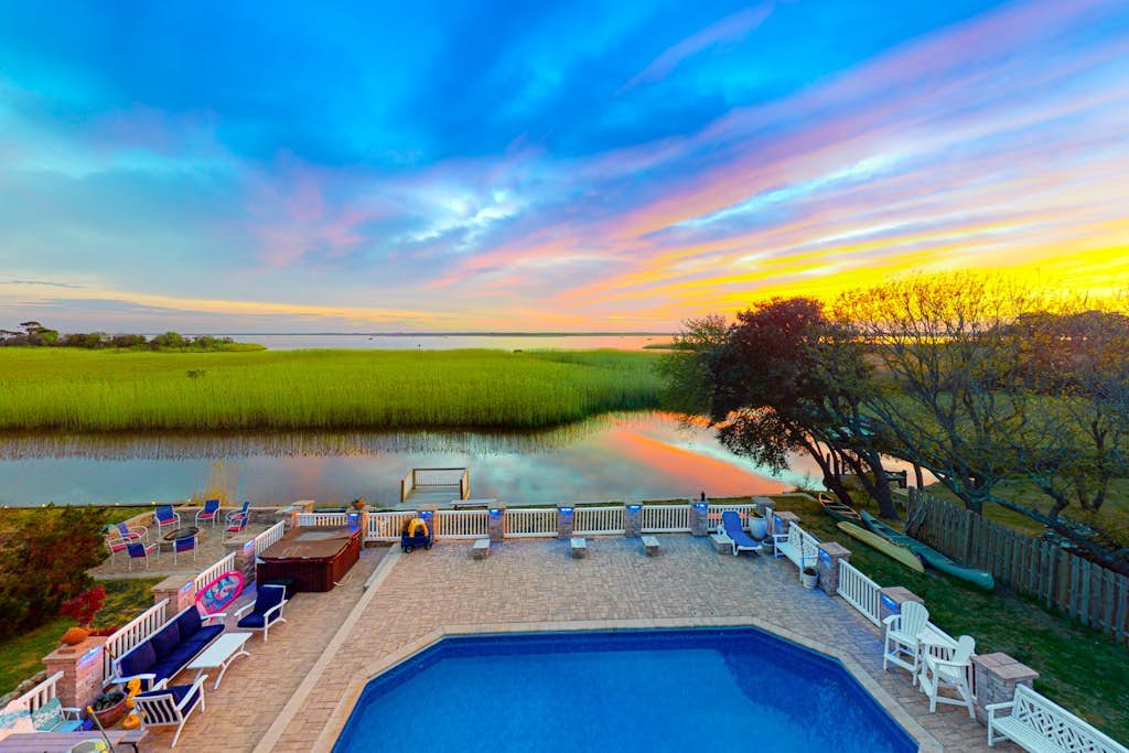 Dog-friendly home on the bay w/private hot tub & pool, central AC, WiFi, W/D