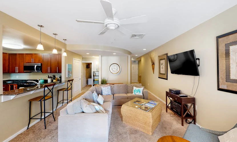 2nd-floor bay- & ocean-view condo with balcony, outdoor pool, grills & gym