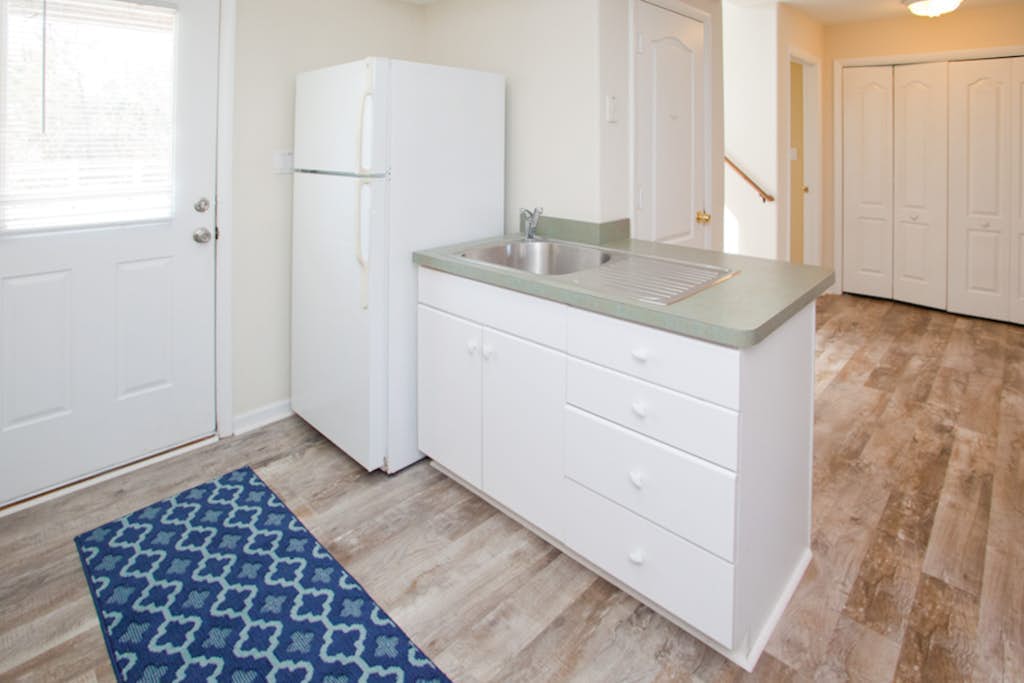 Sunlit 3-story home with private in-ground pool, balcony, washer/dryer