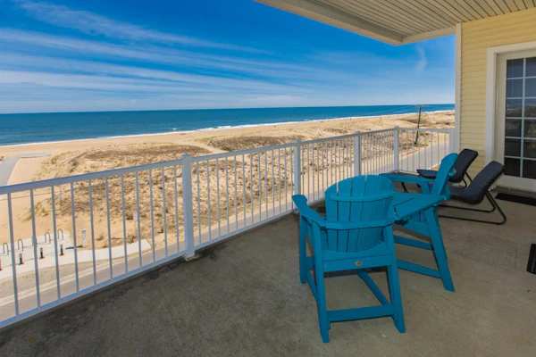 Oceanfront, corner condo with wrap-around deck, great views & on-site pool/gym