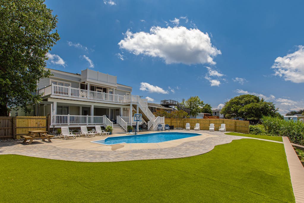Lovely canal-front home between bay & beach with private pool, dock, & AC