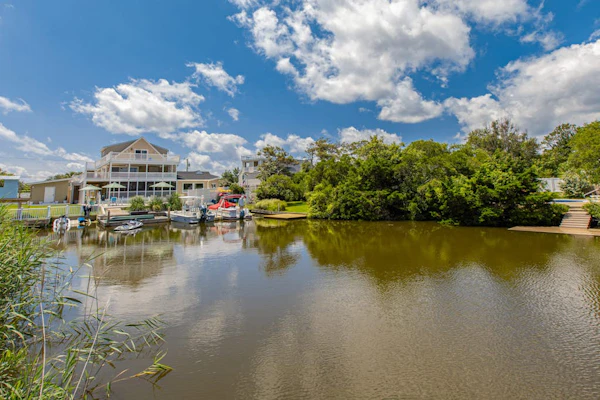 Lovely canal-front home between bay & beach with private pool, dock, & AC