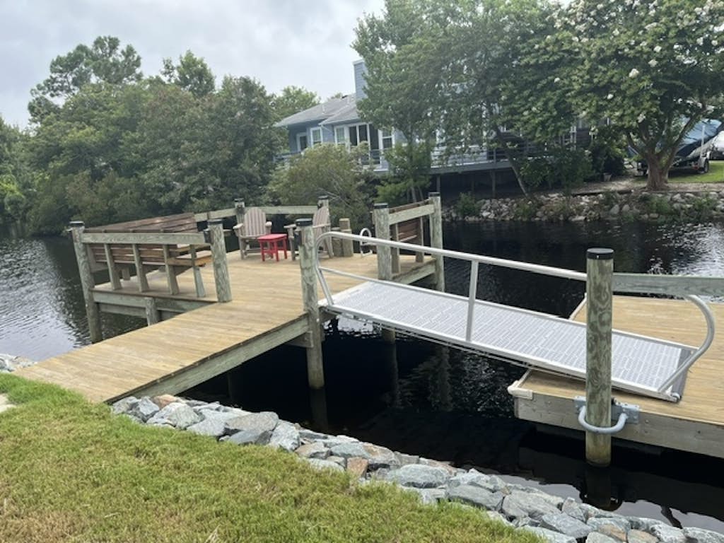 Contemporary home on canal w/elevator, dock, private washer/dryer, central AC