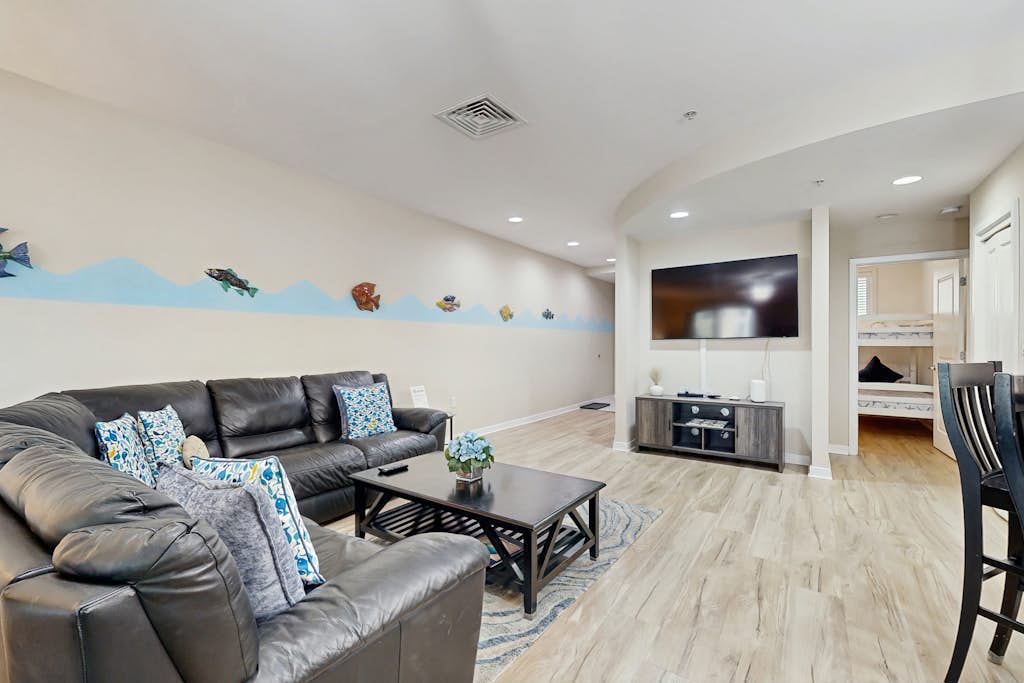 Renovated condo with ocean and back bay views, central AC, & pools