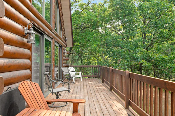 Secluded, dog-friendly home with tree-lined view, firepit, fireplace, & deck