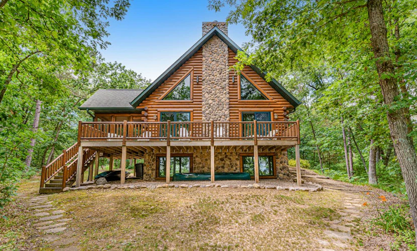 Riverfront cabin with a dock, kayaks and a canoe - firepit and water views