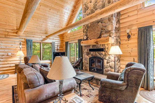 Riverfront cabin with a dock, kayaks and a canoe - firepit and water views