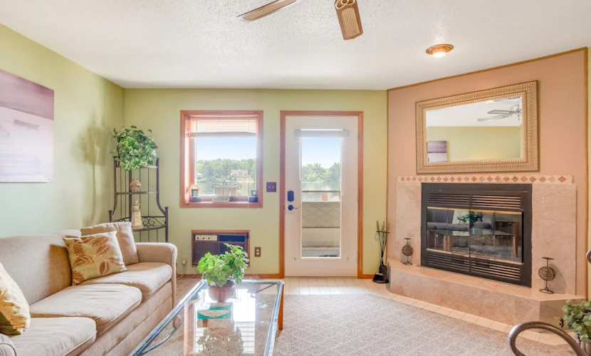 Waterfront condo with resort amenities, grill, firepit, jetted tub, & partial AC
