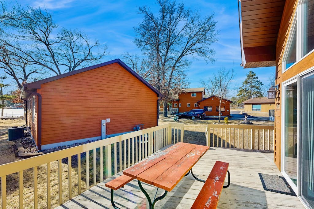 Lakefront condo near golf with amazing views, private beach access, & fireplace