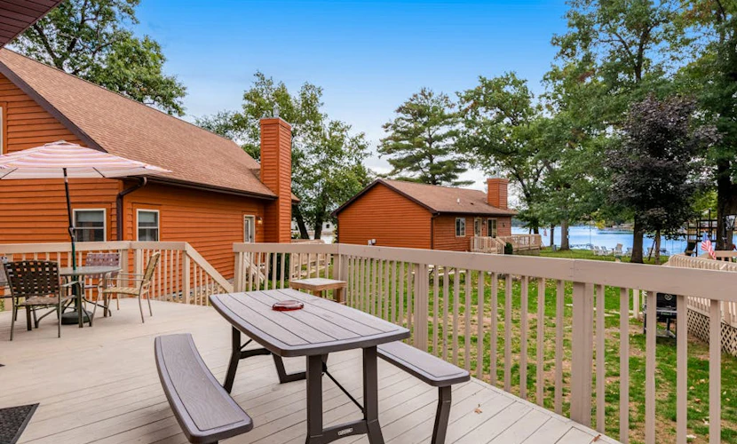 Inviting lakefront stand-alone condo with private beach, boating, & playground