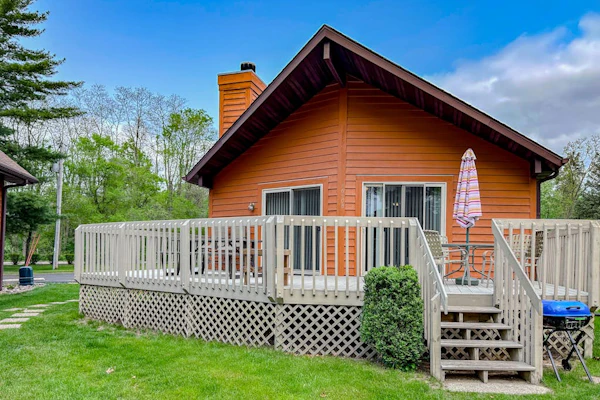 Inviting lakefront stand-alone condo with private beach, boating, & playground