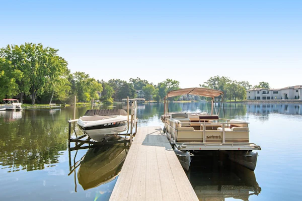 Inviting lakefront retreat - amazing views, beach access, dock & inviting deck