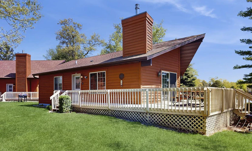 Lakefront retreat with panoramic views, large backyard, & direct beach access