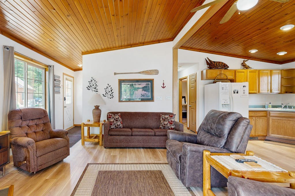 Lakefront retreat with panoramic views, large backyard, & direct beach access