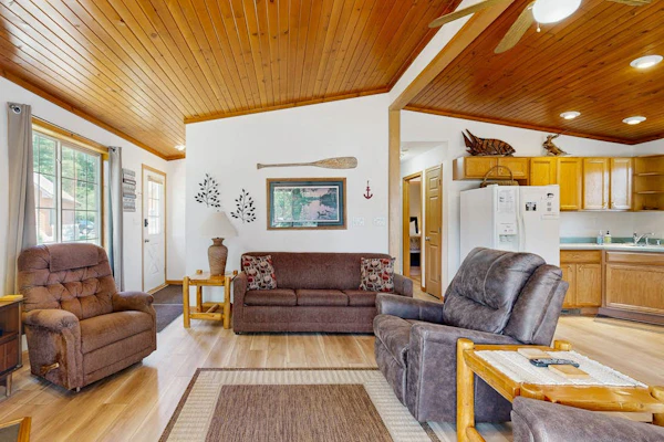Lakefront retreat with panoramic views, large backyard, & direct beach access