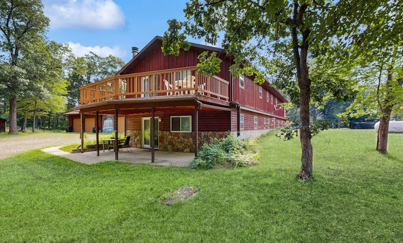 Two-family retreat with 2 kitchens, wooded charm near lakes, trails & adventure