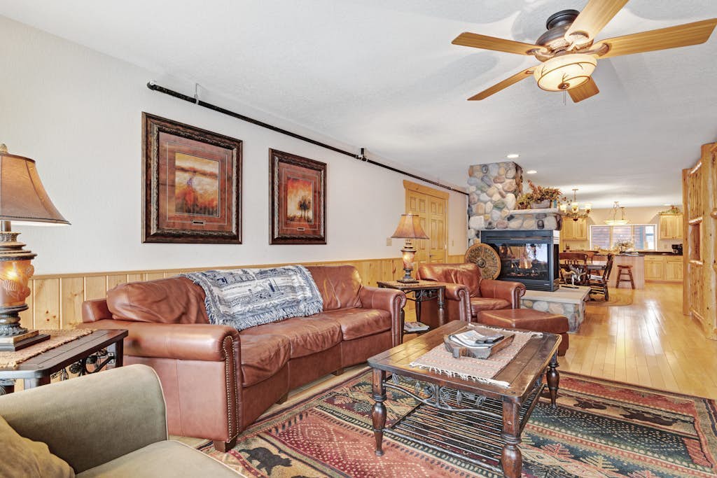 Waterfront townhome with fireplace, private patio, & shared boat docks