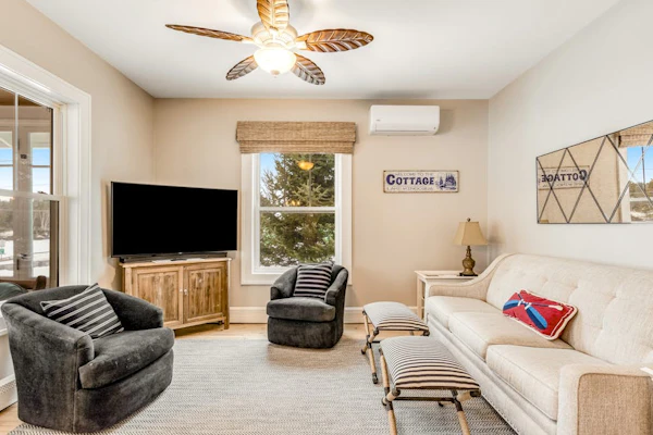 Charming lakefront home with shared dock, porch, & sunroom - walk downtown