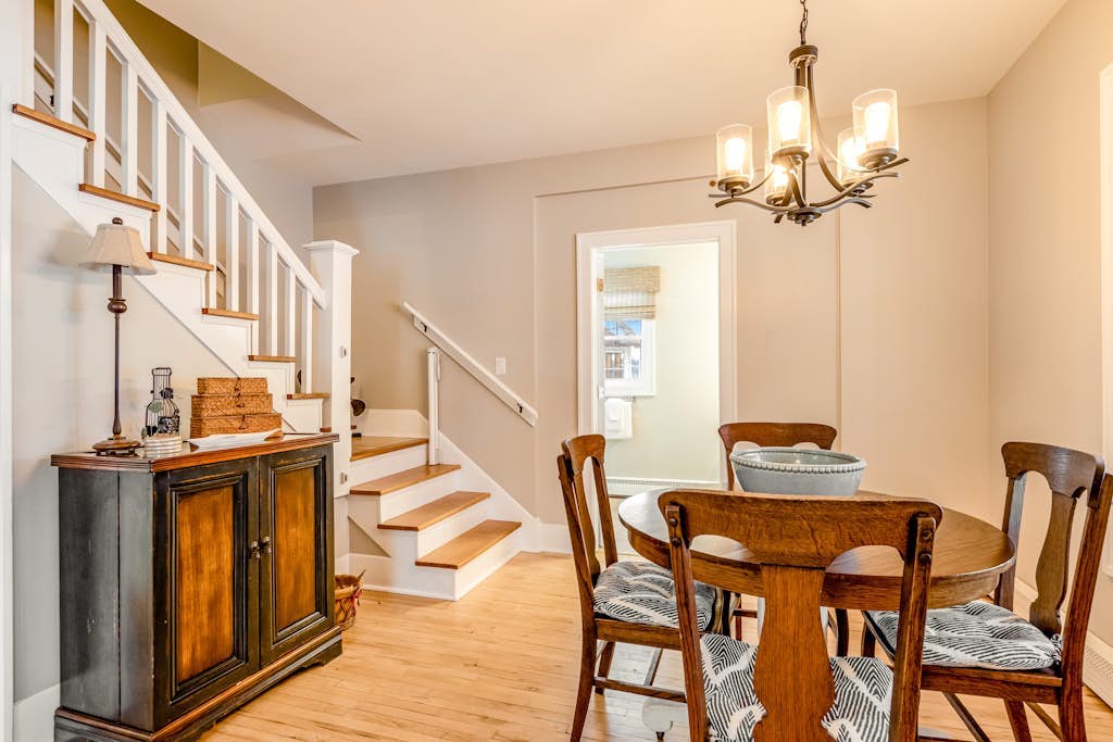 Charming lakefront home with shared dock, porch, & sunroom - walk downtown