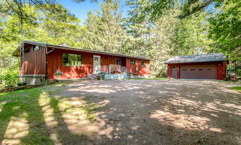 Dog-friendly, lakefront home with dock, kayaks, canoe, bike & fireplace