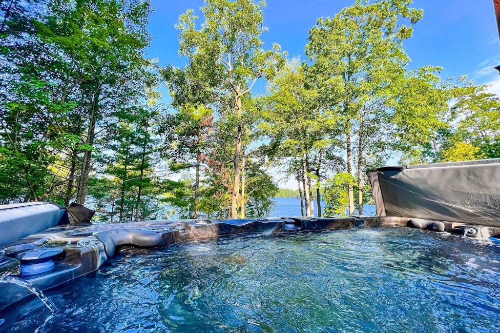 Lakefront estate with 3-story chalet & guest house - hot tub, game room, and gym